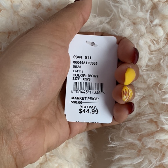 We have a Very Pretty comfortable XS/S Tan Vest. - Picture 3 of 4